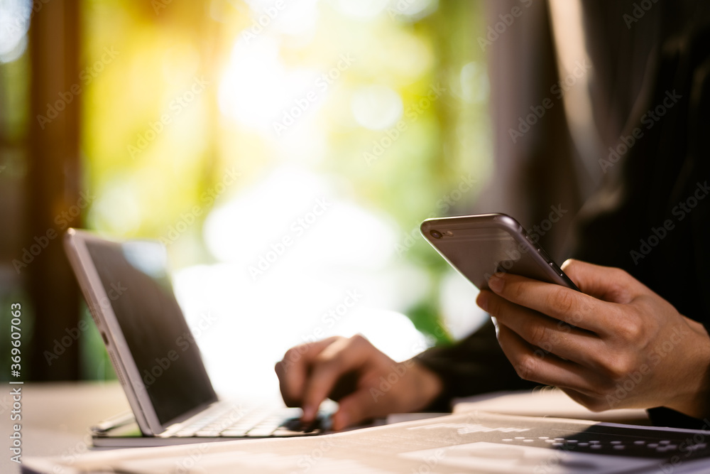 businessman using mobile phone and laptop. businessman using mobile phone and laptop.