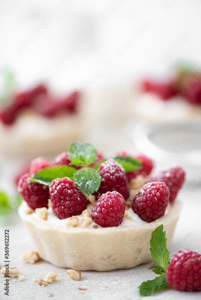 dessert with mascopone cheese, fresh raspberries and nuts dessert with mascopone cheese, fresh raspberries and nuts