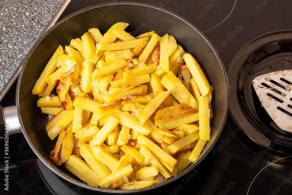 Fried potatoes in a pan Fried potatoes in a pan