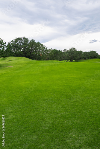 View of Golf Course with fairway field. Golf course with a rich green turf beautiful scenery.