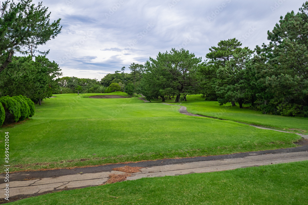 View of Golf Course with fairway field. Golf course with a rich green turf beautiful scenery.