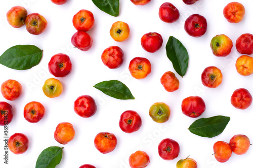 Small red organic acerola cherry fruit (Malpighia Glabra) seamless pattern texture background.