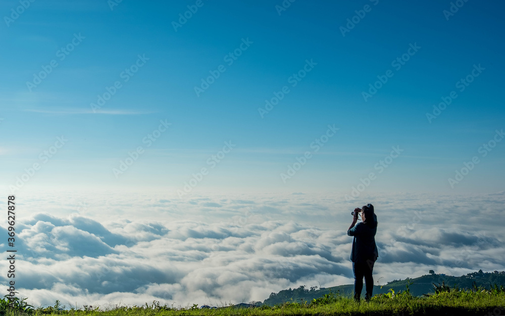 Fototapeta premium Fog with mountains, beautiful sunrise at Phu thap berk, Phetchabun, Thailand. August 2020. 