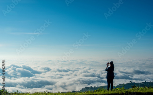 Fog with mountains, beautiful sunrise at Phu thap berk, Phetchabun, Thailand. August 2020. 