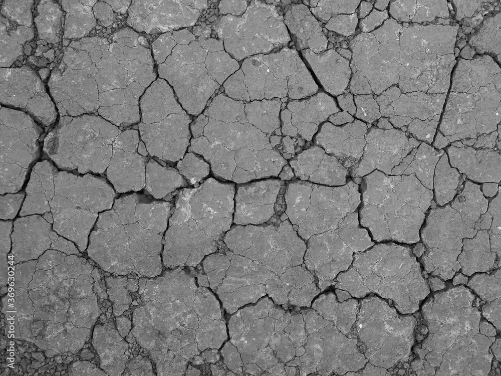 A texture of a dry chapped or cracked ground A texture of a dry chapped or cracked ground