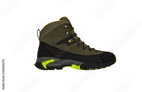 Modern mountain boots isolate on a white back. Shoes for outdoor activities and travel.