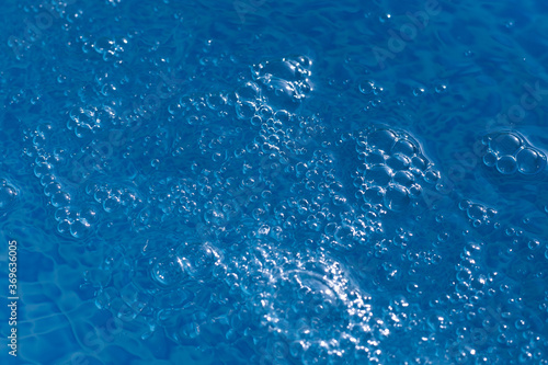 blue water with bubbles and blue drops background