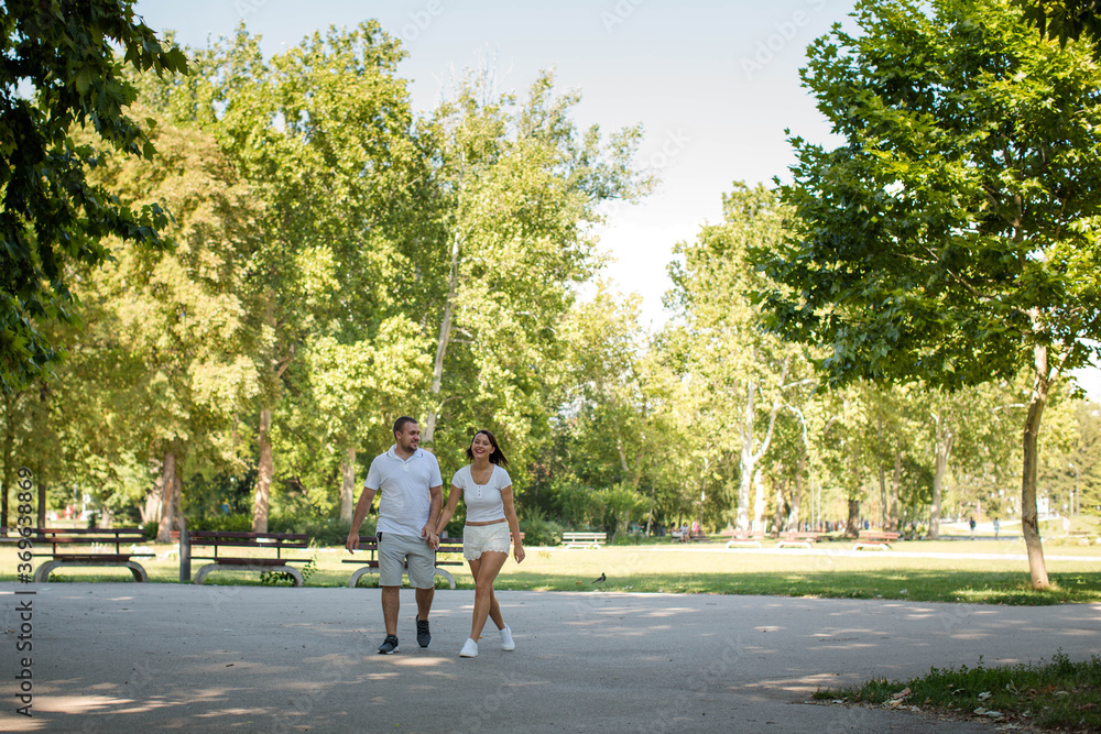 couple walking in park