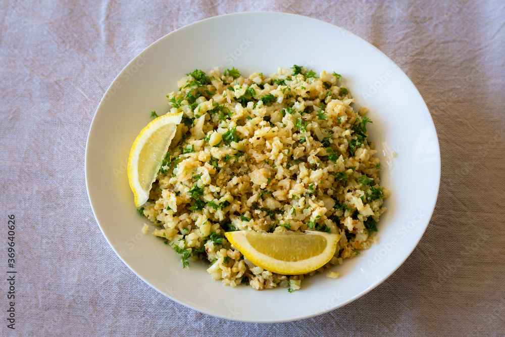 Cauliflower rice with finely chopped parsley with chicken Cauliflower rice with finely chopped parsley with chicken