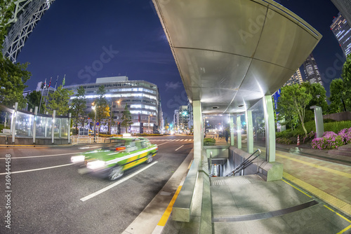 Taxi speeds up in Tokyo at night © jovannig