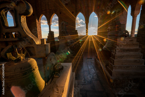 Sun rays entering through a window of the Mudejar tower of El Salvador in Teruel