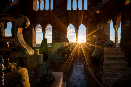 Sun rays entering through a window of the Mudejar tower of El Salvador in Teruel