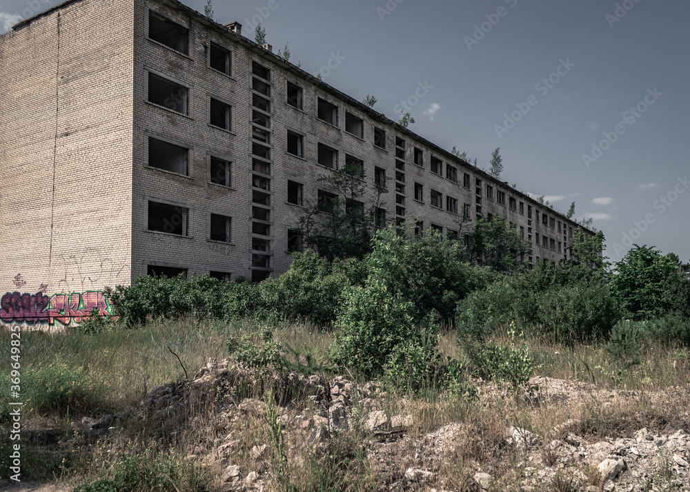 Abandoned building behind the bushes in a secret USSR military city