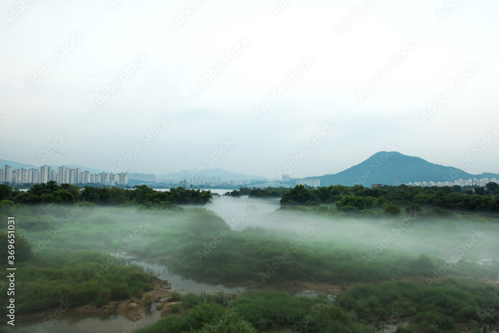 Fantastic landscape of foggy and mist riveside Fantastic landscape of foggy and mist riveside