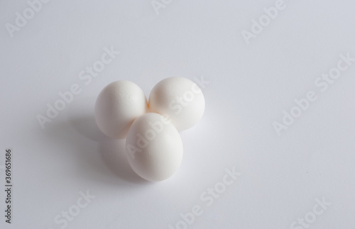 Raw white eggs isolated on white background
