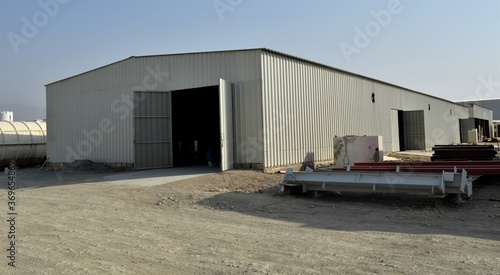 outdoor view of Industrial warehouse in the site. Industrial warehouse interior and outdoor of roof ceiling structure.