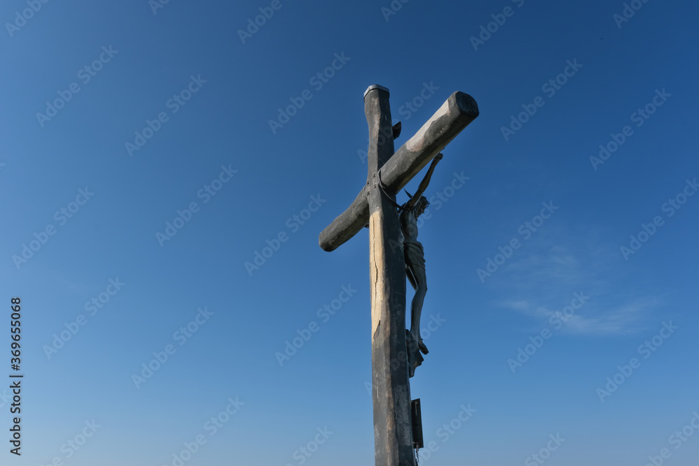 cross positioned on the grasslands on the slopes of the gran sasso italy cross positioned on the grasslands on the slopes of the gran sasso italy