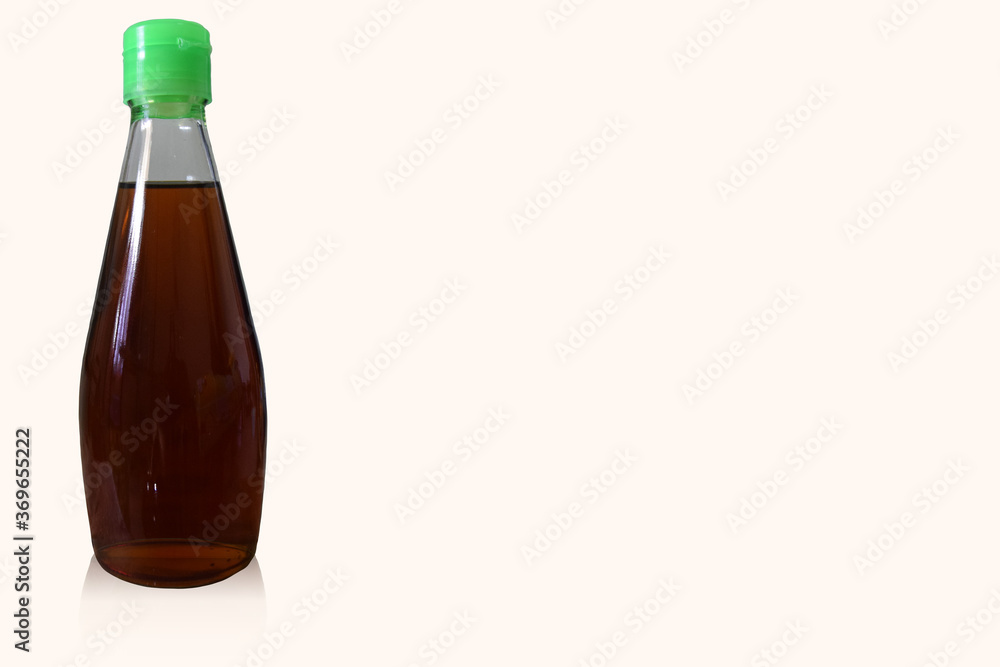 Fish sauce in glass bottle isolated on white background by Thailand 2020 Year. Fish sauce in glass bottle isolated on white background by Thailand 2020 Year.