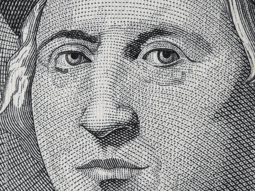 Christopher Columbus face portrait on Bahamas one dollar (1992) banknote macro. Cristobal Colon was an Italian explorer, navigator, colonizer and discoverer of America.