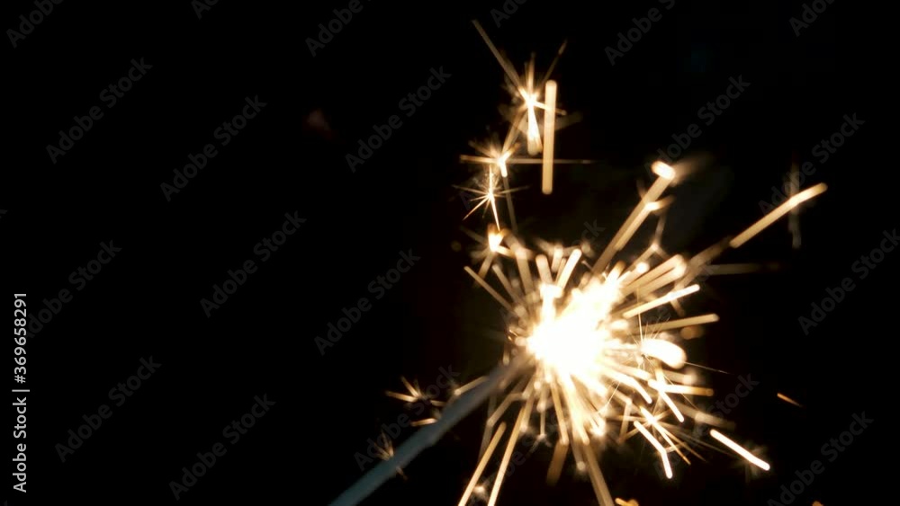 A sparklers fire in the night. A sparklers fire in the night.
