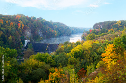 Autumn view of the dam on the river Teterev early in the morning, Ukraine photo