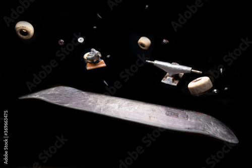 Skateboard parts exploding into air space