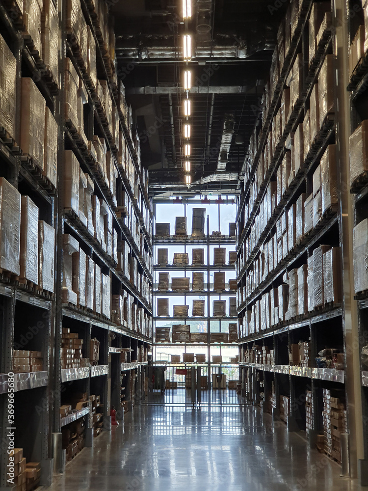 Modern Warehouse Aisle in a Distribution Center Modern Warehouse Aisle in a Distribution Center