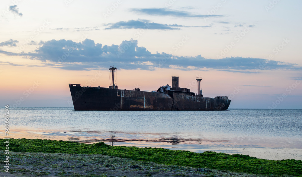A shipwreck. An old wreck abandoned at sea. The wreck of the ship A shipwreck. An old wreck abandoned at sea. The wreck of the ship