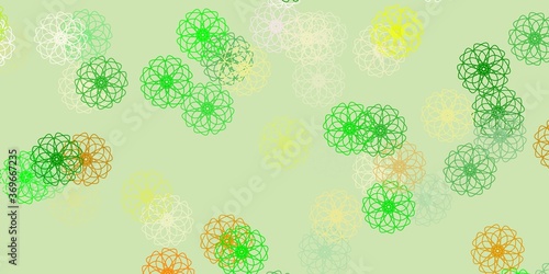 Light green, yellow vector doodle pattern with flowers.