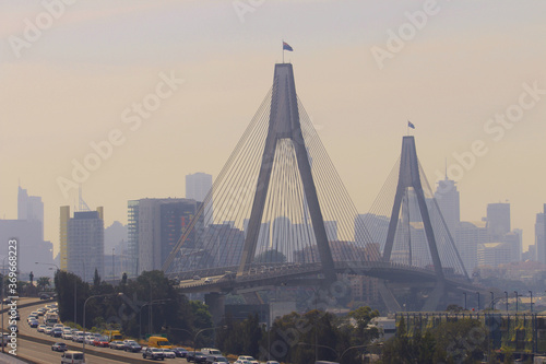 Photography Cityscape of bridge and buildings with bush fire smoke haze in the city