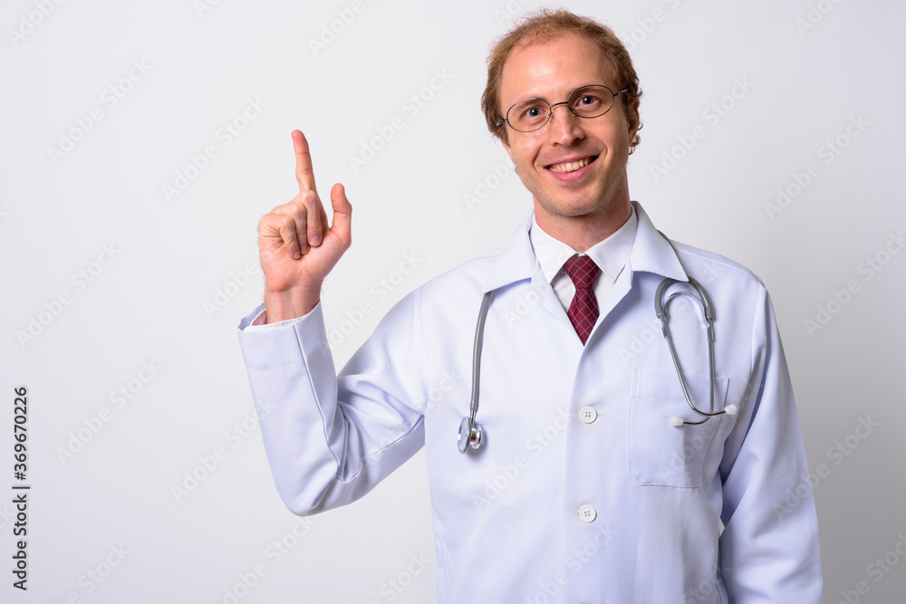 Portrait of happy man doctor with blond hair Portrait of happy man doctor with blond hair