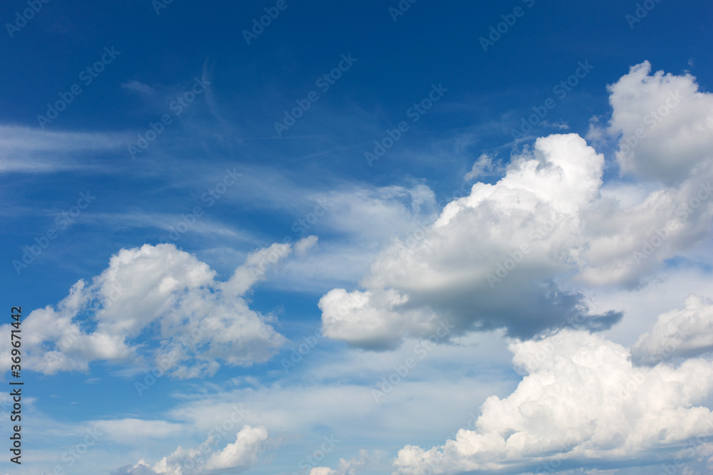 Obraz premium White clouds on blue sky background.