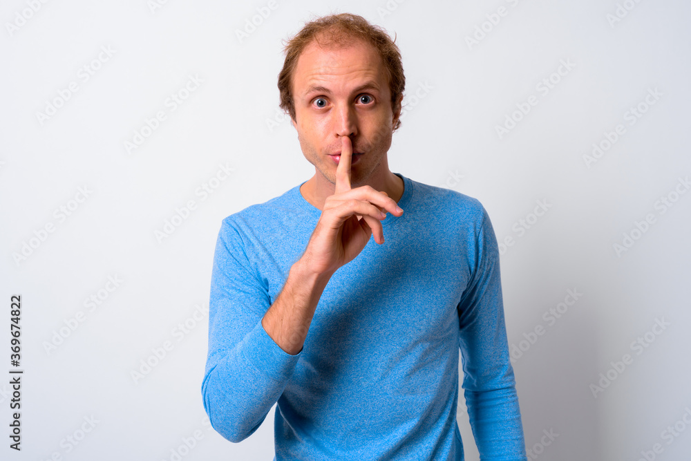 Man with blond hair against white background Man with blond hair against white background