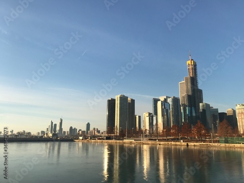 Downtown Chicago skyline with reflections on the Michigan lake. Early morning. Chicago  Illinois  United States.