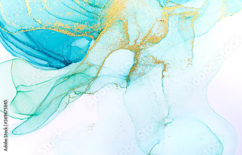 Alcohol ink blue abstract background. Ocean style watercolor texture. Blue and gold paint stains illustration