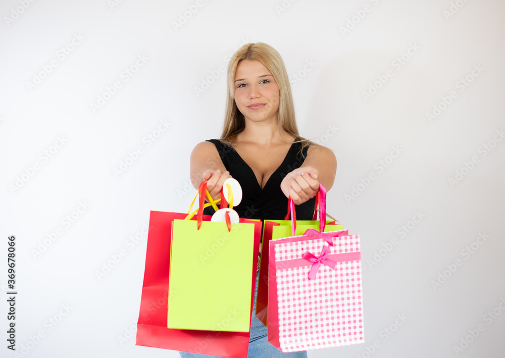 Pretty girl with shopping bags in her hands Pretty girl with shopping bags in her hands