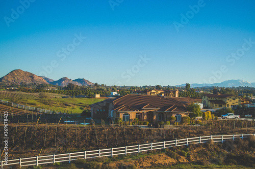 areal view of rolling hills on a hot air balloon in Temecula southern california early morning ride sunrise in January winter 