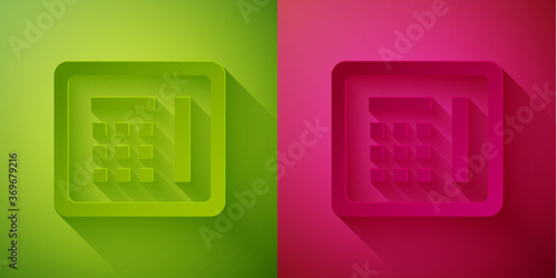 Paper cut Safe icon isolated on green and pink background. The door safe a bank vault with a combination lock. Reliable Data Protection. Paper art style. Vector Illustration.