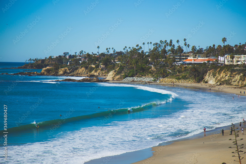 Laguna Beach is a small coastal city in Orange County, California known for it art galleries, coves and beaches. Main Beach boardwalk  paths and gardens of nearby Heisler Park. stock photo 