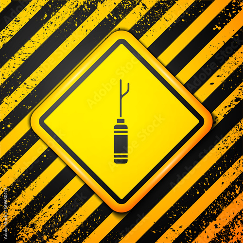 Black Awl tool with wooden handle icon isolated on yellow background. Work equipment tailor industry. Warning sign. Vector Illustration.