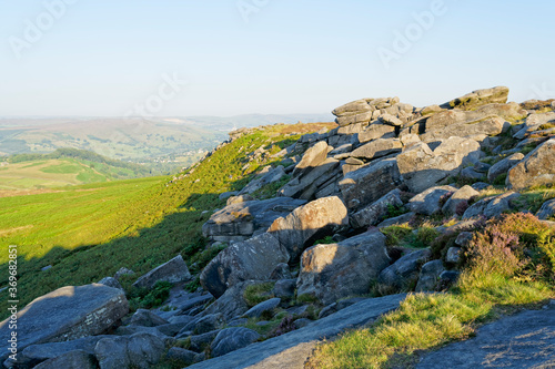 Along the slopes of Higger Tor, across Hathersage Moor on hazy morning
