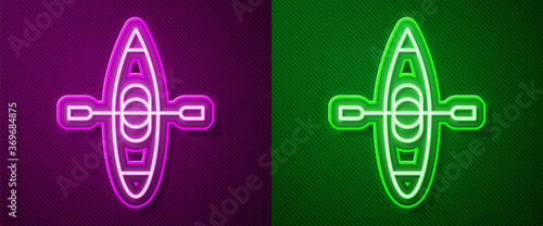 Glowing neon line Kayak and paddle icon isolated on purple and green background. Kayak and canoe for fishing and tourism. Outdoor activities. Vector Illustration.