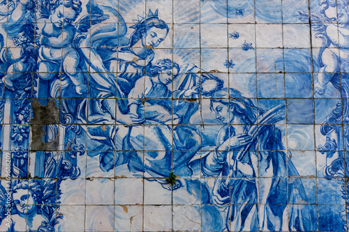 Tile painting, religious art. Blue traditional portuguese tiles. Santa Catarina church, Porto, Portugal photo