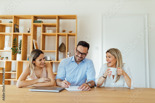 Happy business team brainstorming, portrait.