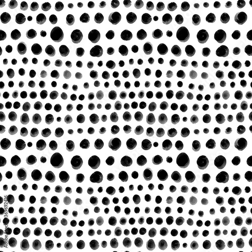 Seamless pattern of ink dots, circles of different sizes. Figure for textiles. Grunge texture.