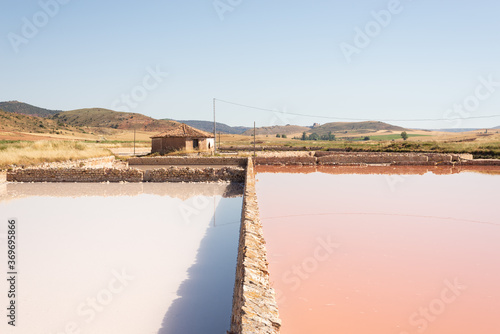 Estanques de evaporación y antigua noria de las salinas abandonadas de Imón. Tomada en Imón, Guadalajara, en julio de 2020. photo