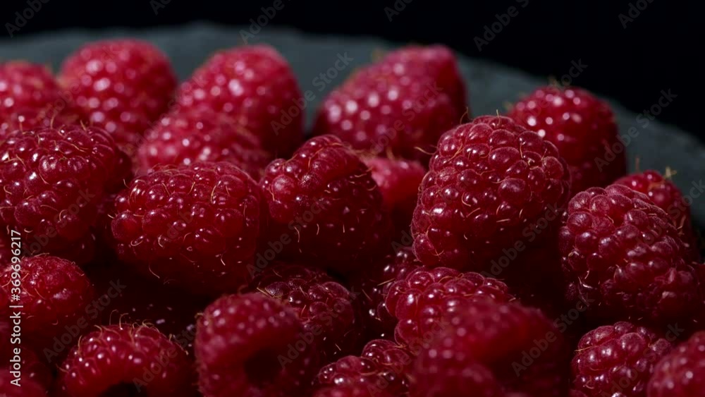 Tasty sweet fruit - ripe raspberry rotating background. Berries is full of antioxidant. Proper vegan nutrition. Healthy lifestyle concept. Tasty sweet fruit - ripe raspberry rotating background. Berries is full of antioxidant. Proper vegan nutrition. Healthy lifestyle concept.