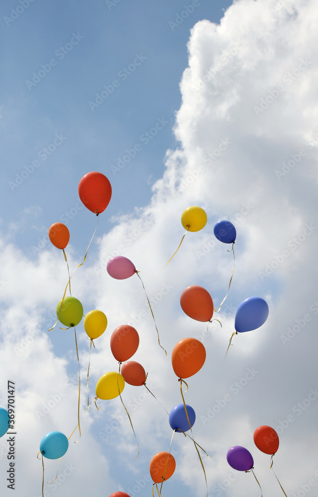 colorful balloons flying in the blue sky