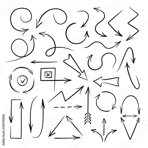 Set of hand drawn paintbrush vector arrows on white.  Doodle sketchy black arrow illustration photo