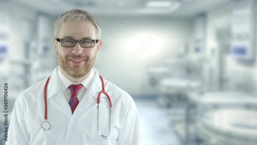 Smiling doctor in the modern operating theatre in a hospital Smiling doctor in the modern operating theatre in a hospital